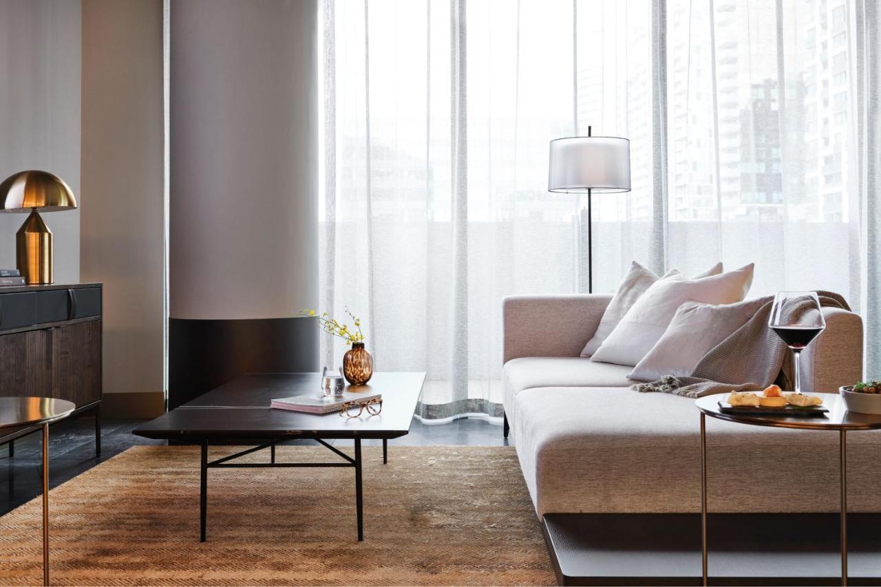 Melbourne Marriott Hotel Docklands المظهر الخارجي الصورة A living room in a private house